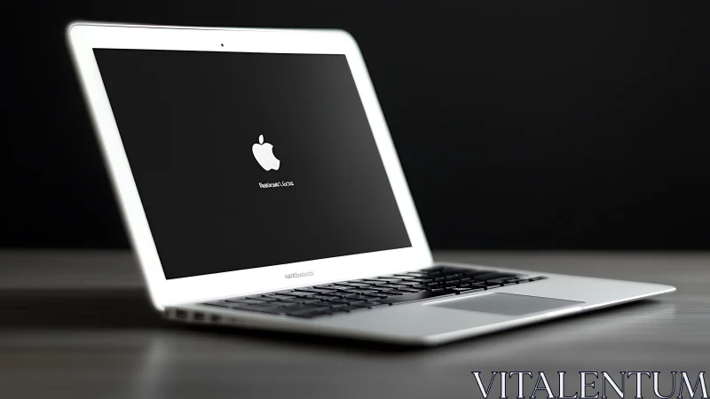 Photorealistic silver laptop in oblique desktop perspective.