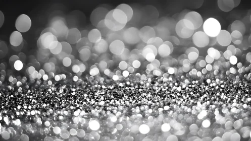 Sparkling Silver Glitter Abstract Background with Bokeh Lights.