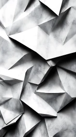 Folded white geometric planes form angular abstract surface