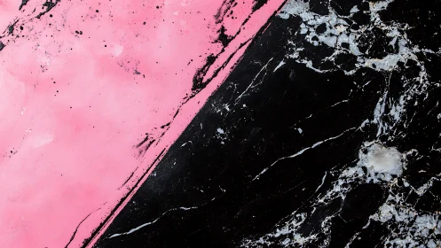 Diagonal split of pink texture against black marble surface.