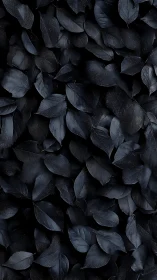 Midnight leaf blanket with soft shimmering shadows.