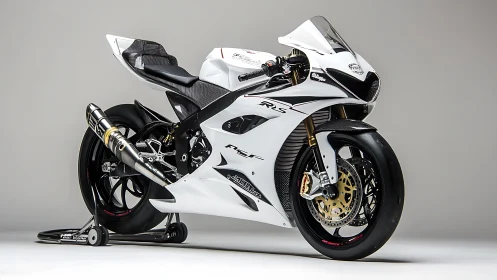 Sleek white superbike stands poised in a minimalist studio