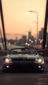 Black Mercedes convertible on city bridge at dusk scene.