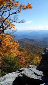 Golden autumn mountains unfold beneath a clear, endless sky