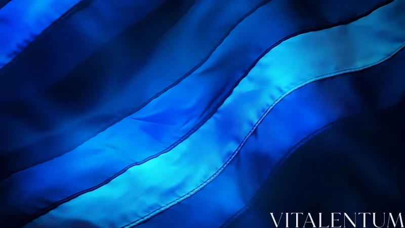 Abstract close-up of layered blue fabric folds.