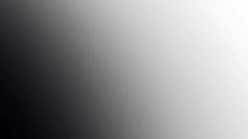 Diagonal grayscale gradient shifts smoothly from dark to light