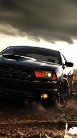 Muscle car powers through rain-soaked dirt under storm clouds