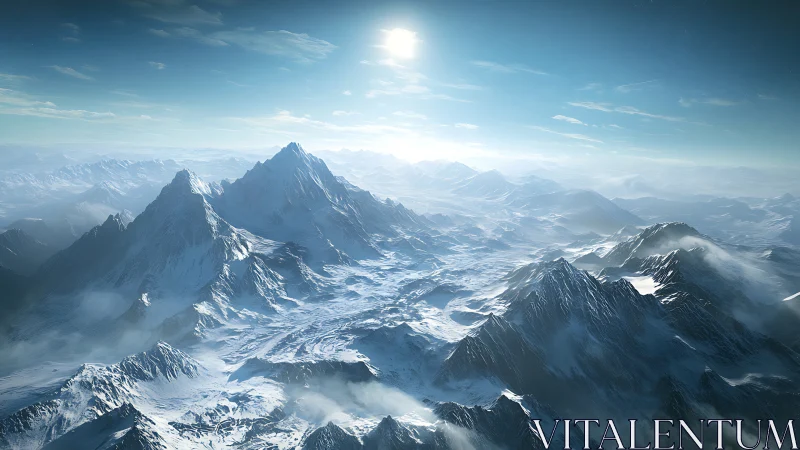 Sunlit snow-covered mountain range under clear sky