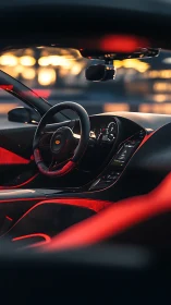 Sportscar cockpit with red ambient interior lighting.