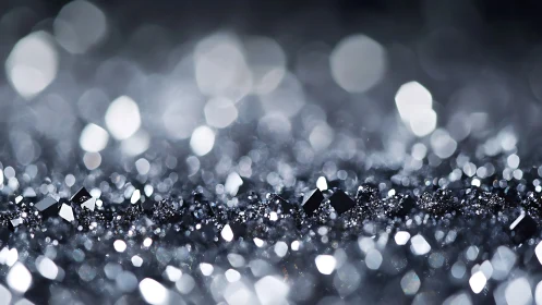 Macro photograph isolates metallic crystals in luminous bokeh field