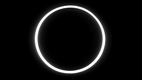 Luminous white neon ring centered on deep black void.