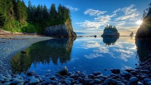 Rocky coastal inlet mirrors vivid blue sunset sky.