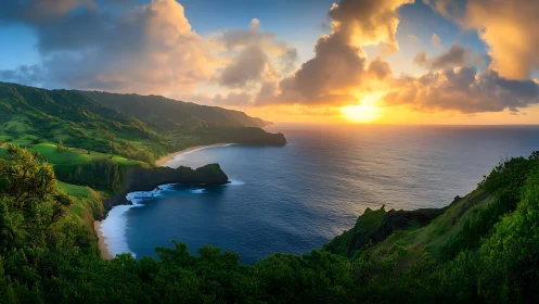 Coastal landscape with cliffs, beach, and sunset over ocean