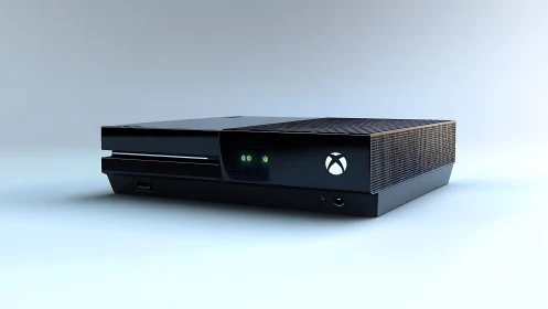 Xbox One Gaming Console Against Light Blue Background.