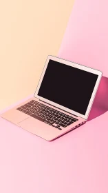 Blush toned laptop lounges across a candy split backdrop