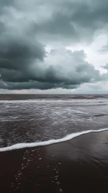 Stormy clouds brood above a dark, reflective shoreline at dusk