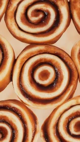 Spiral-configured cinnamon rolls with caramelized surface glazing.
