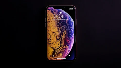 iPhone XS Max with Vibrant Liquid Wallpaper.