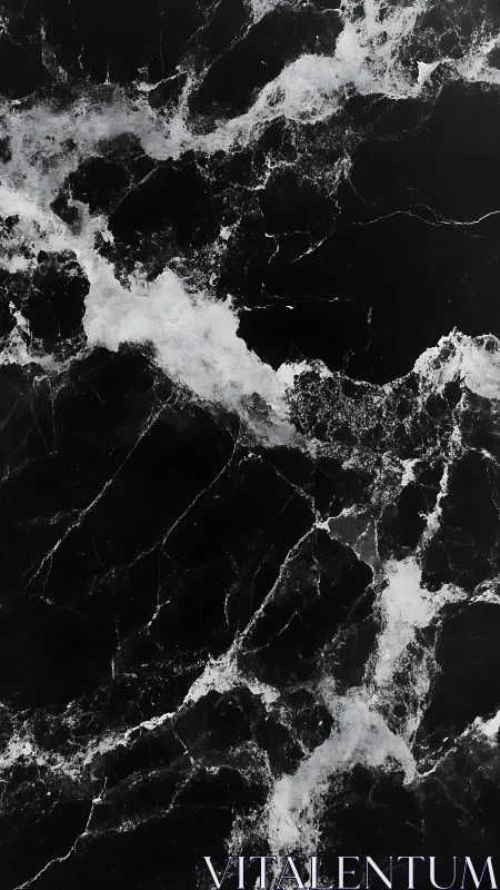 Velvety black marble surface flows with soft white veining