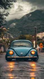 Blue vintage VW Beetle on wet street at dusk.