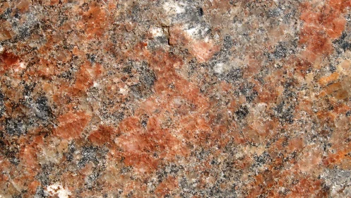 Close-up of Polished Granite Surface with Red and Gray Tones.