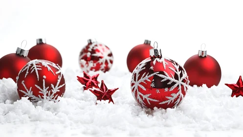 Crimson snowflake baubles glimmer softly in winter hush.