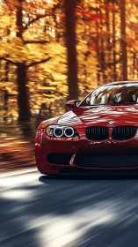 Red BMW sports coupe speeds through glowing autumn forest.