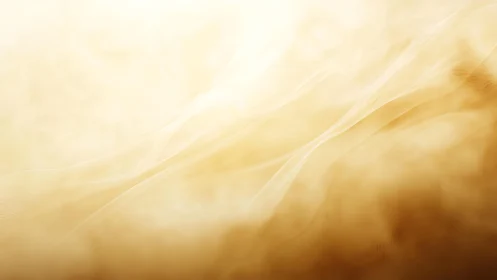 Soft golden abstract background with flowing fabric texture.