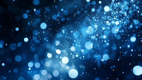 Blue bokeh light field with floating glitter particles.