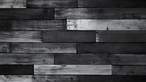 Charcoal stained wooden planks create a bold modern backdrop