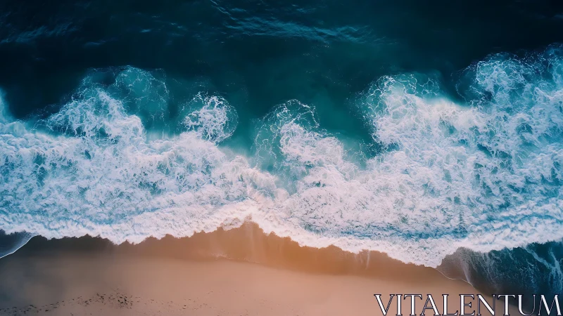 Gentle turquoise surf brushing soft peach evening sand.