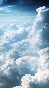 Dense cumulus cloudscape extends under bright upper sky