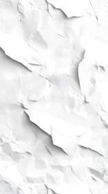 White paper cliffs crumble softly into sculpted shadows