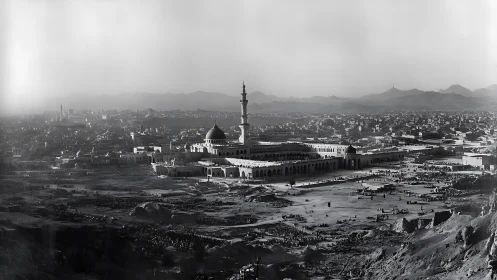 Panoramic view shows large mosque complex within desert city