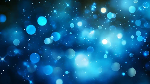 Blue night sparkles drifting through a dreamy cosmos.