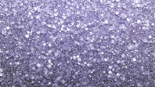 Macro optical field of violet glittering crystalline particles.