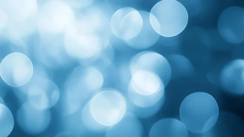 Soft Blue Bokeh Abstract Background with Light Circles Effect.