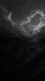 Lunar crescent framed by storm clouds in chiaroscuro digital art.