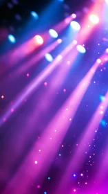 Dreamy stage lights pour soft neon color into the night