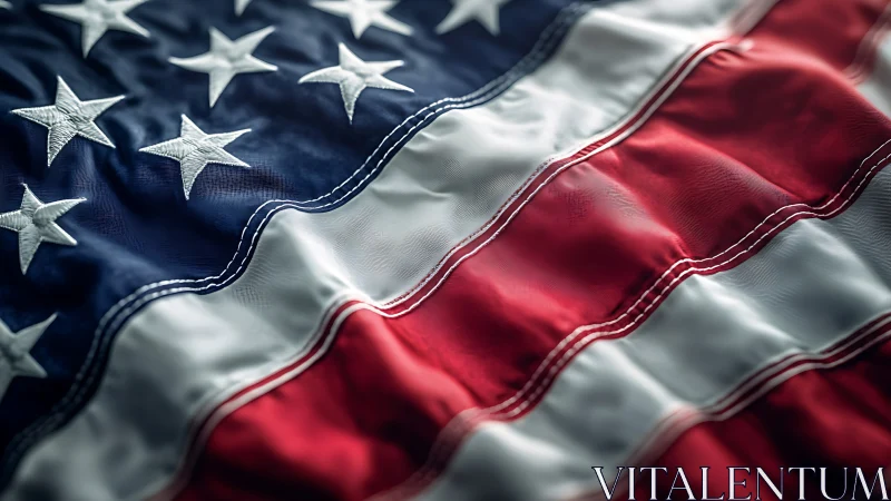 Close-up American flag fabric with vivid stitched stripes.