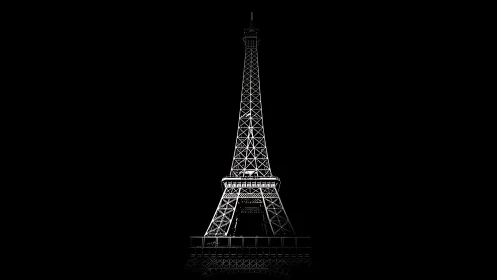 Eiffel Tower stands illuminated against deep black night sky.