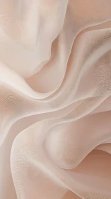 Soft blush silk folds drift in gentle flowing waves.