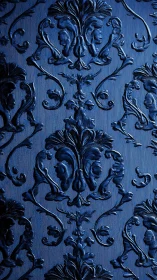 Ornate blue damask pattern with raised baroque motifs.