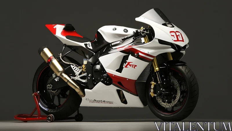 White racing motorcycle on paddock stand in studio setting.