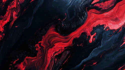 Red fluid streaks across dark marbled abstract surface.