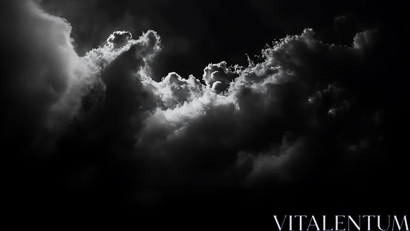 Backlit storm clouds carve glowing edges in darkness.