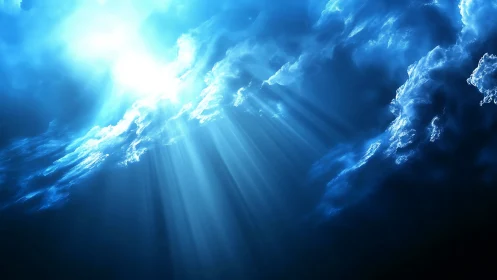Radiant blue heavenlight breaks through storm-tossed clouds