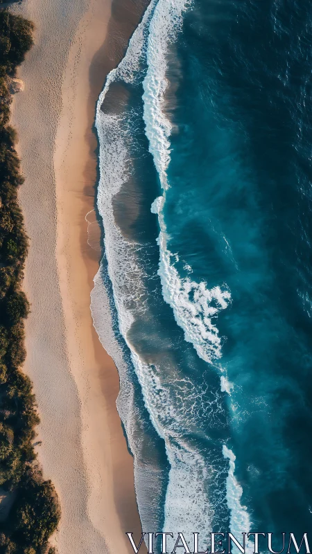 Shoreline symmetry with rolling aqua waves from above.