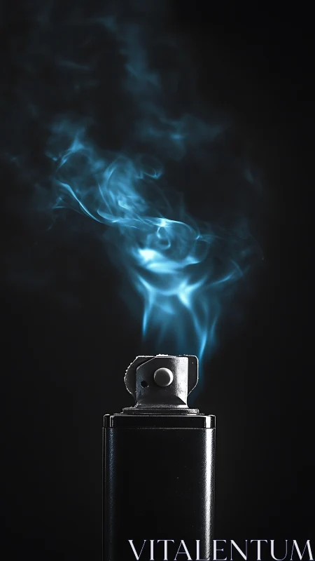 Metal lighter with blue smoke on dark isolated background.