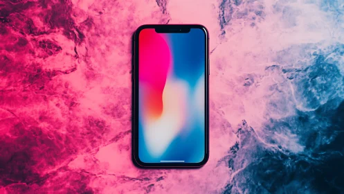 iPhone X Smartphone Displayed Against Vibrant Pink-Blue Gradient Texture.